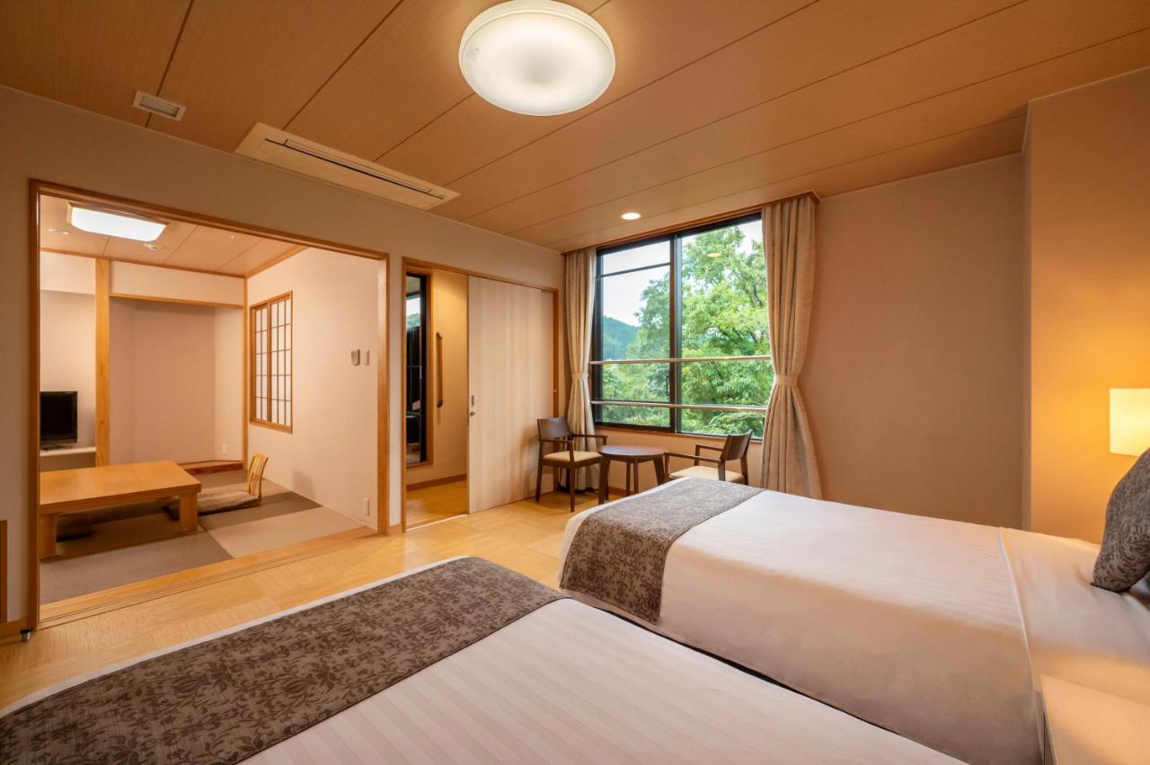 Kamenoi Hotel Ome Quarto foto